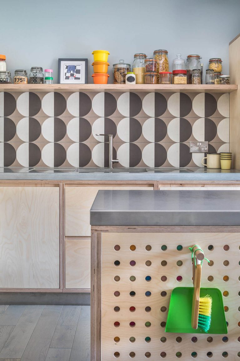 Pegboard Plywood Kitchen with halfmoon porcelain tiles