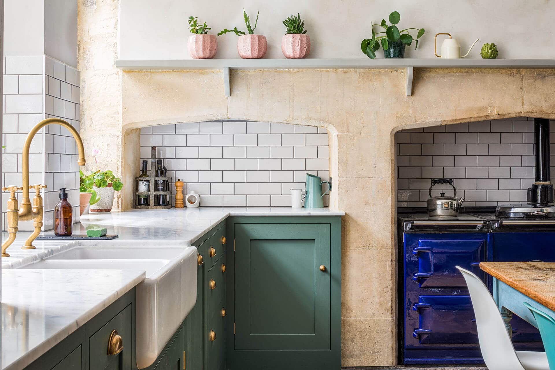 Green Shaker Kitchen with Brass Accents and mantle