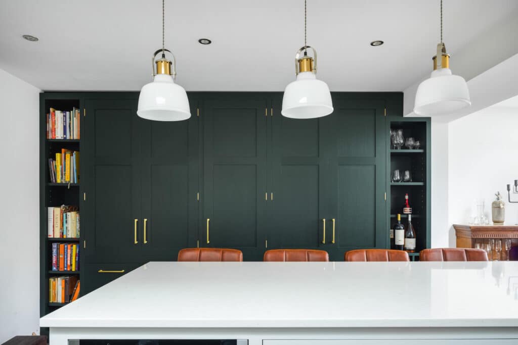 Obsidian Green Kitchen - White Island with tall run of cabinets