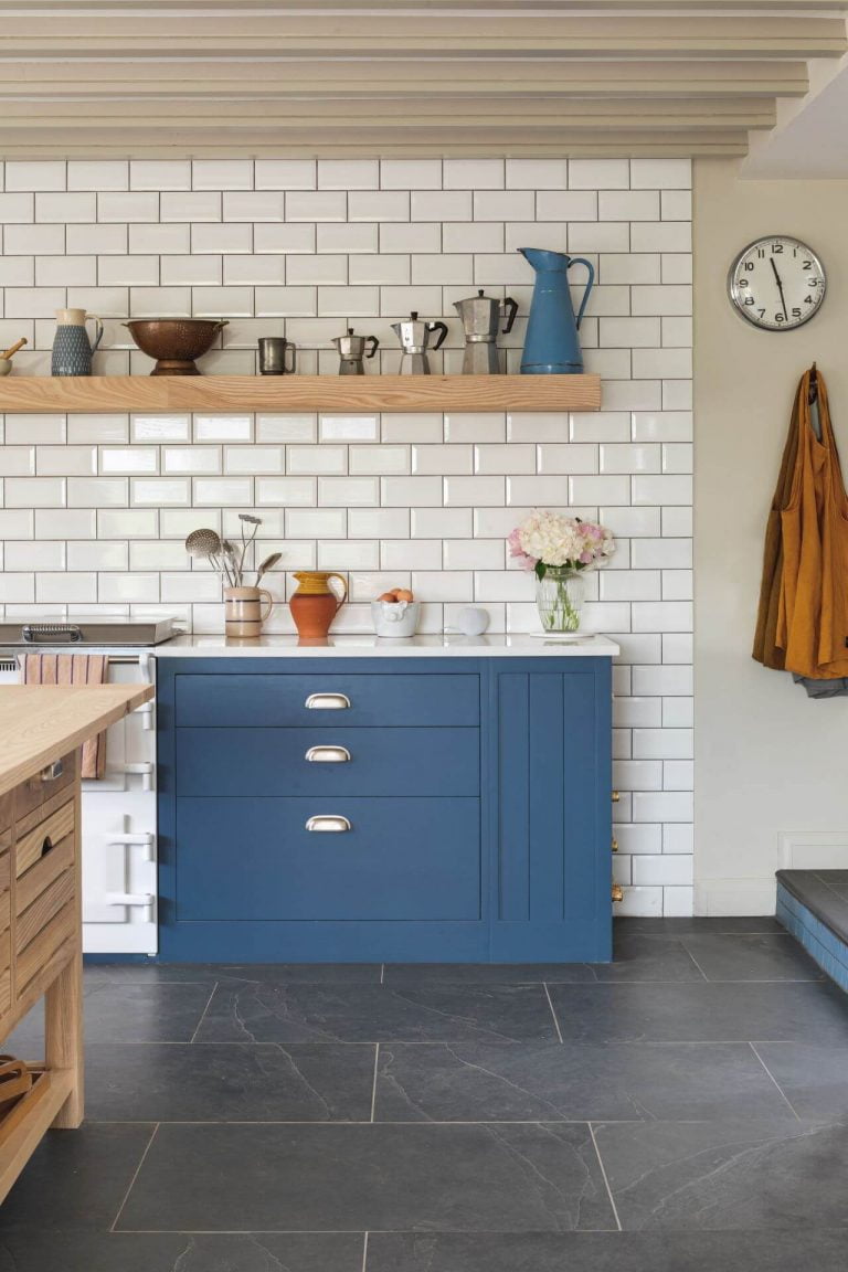 Farmhouse Kitchen - Stiffkey Blue, white metro tiles and floating shelf