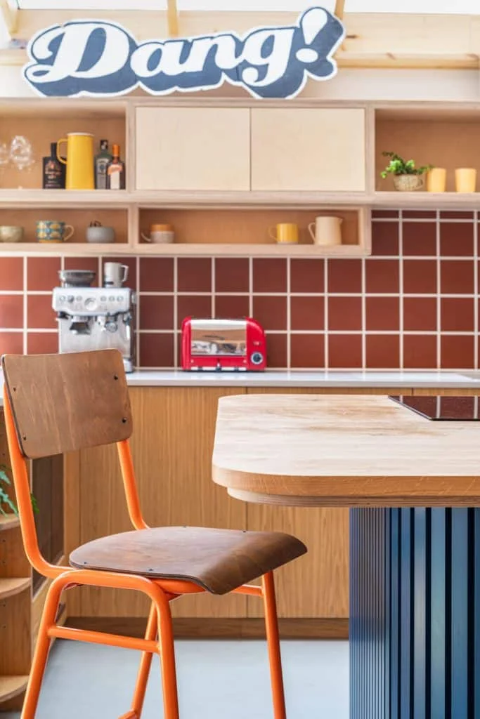 Bespoke plywood and oak veneer cabinetry with slatted island